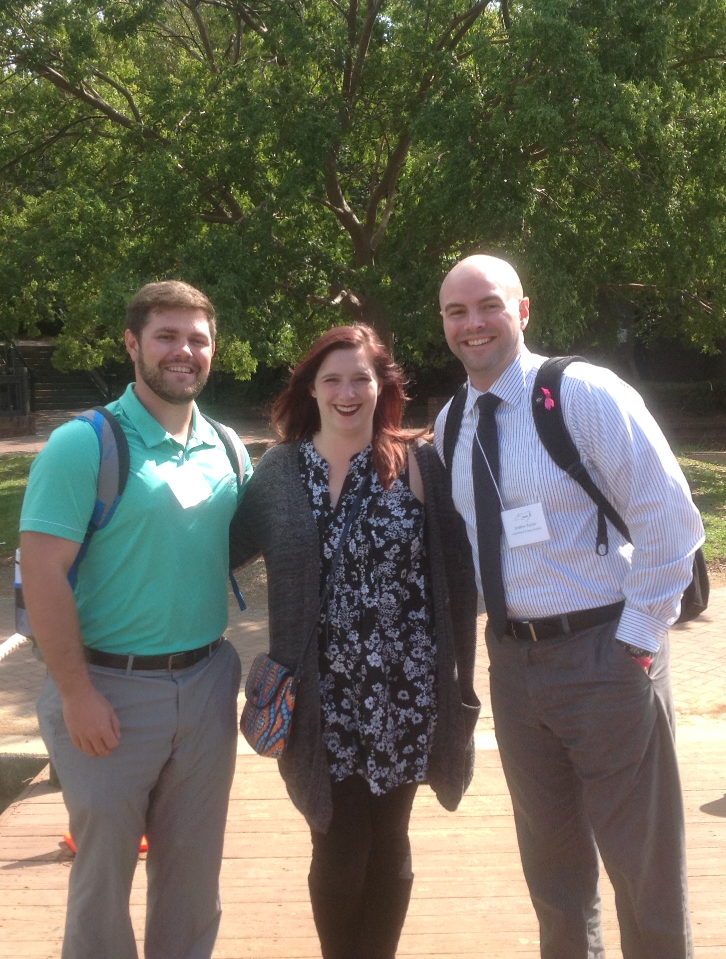 three people standing